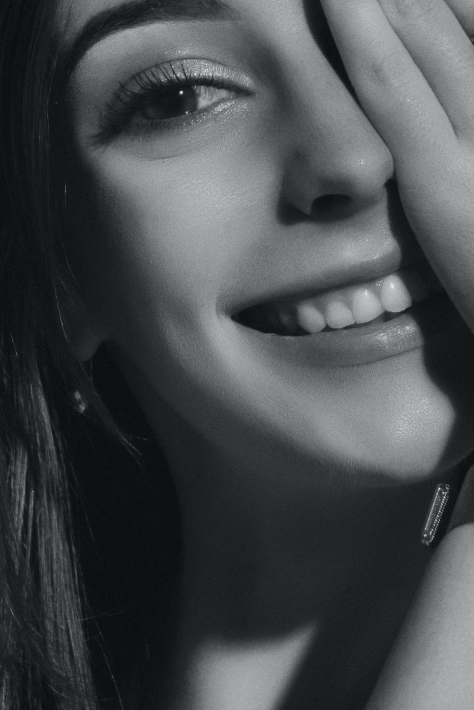 Girl Covering One Eye